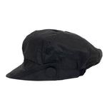 black-waxed-baker-boy-cap-with-side-of-peak-turned-up-with-button