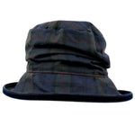 ladies navy tartan waxed rain hat with blue trim on edge of brim