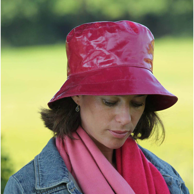 pink pvc ladies bucket hat on woman