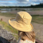 ladies linen sun hat in mustard colour